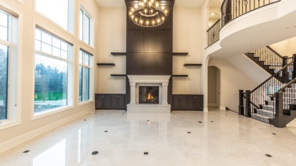 Davidson great room fireplace wall with tall windows