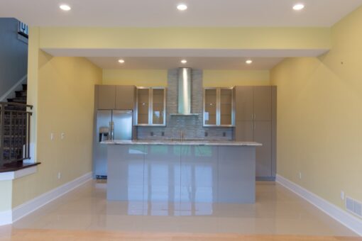 Ravenna lower-level kitchen with high-gloss gray cabinetry
