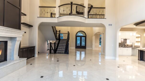Davidson great room with balcony and arched entry doors