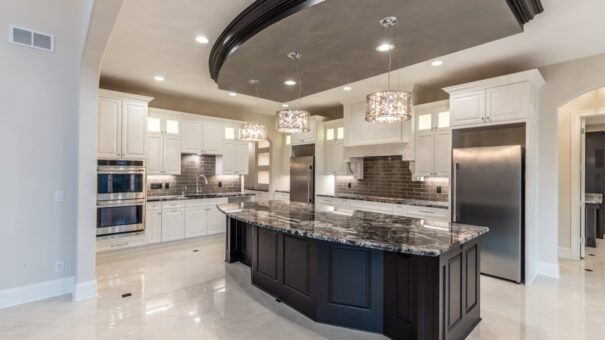 Davidson kitchen island with granite and chandeliers