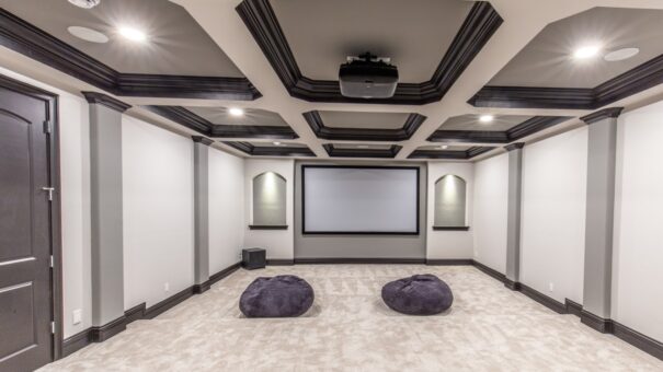 Davidson lower-level home theater with coffered ceiling and screen