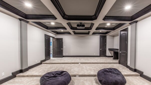Davidson lower-level media room with coffered ceiling