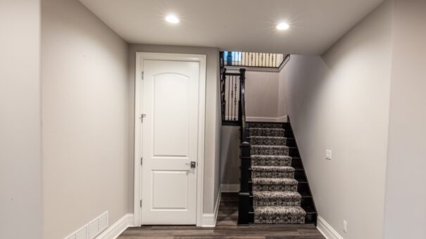 Davidson staircase to the lower level with patterned runner
