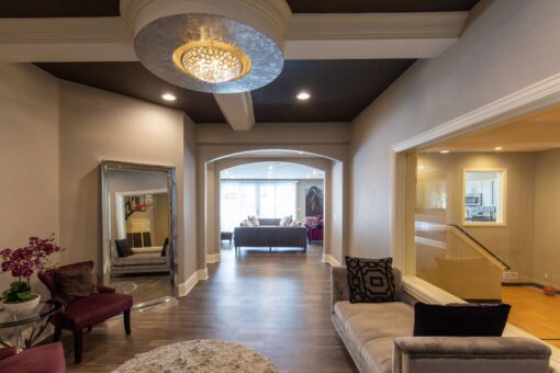 Summerhill lower-level hallway with tray ceiling