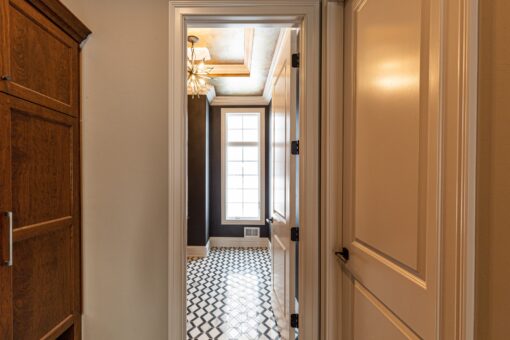 Birchwood bathroom with patterned tile floor