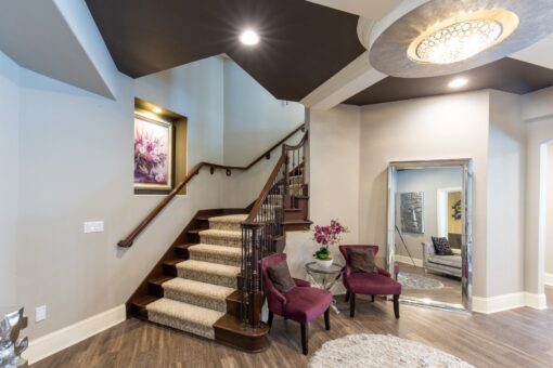 Summerhill lower-level staircase and sitting area