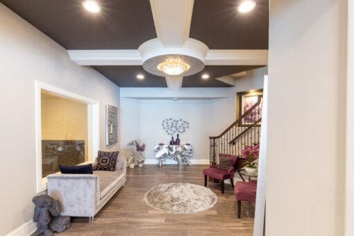 Summerhill lower-level lounge with tray ceiling