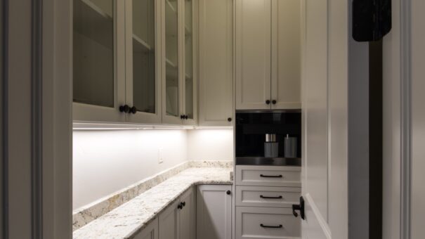 Bella Haven kitchen coffee station with glass cabinets