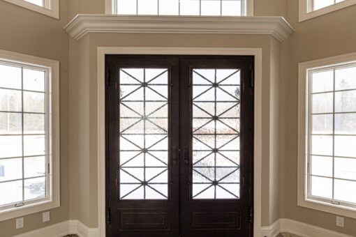 Birchwood iron and glass double entry doors from inside