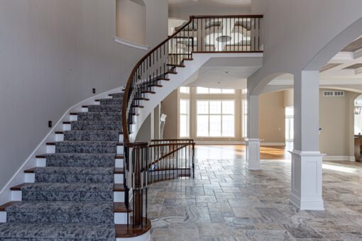 Birchwood curved staircase in the two-story foyer