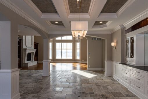 Birchwood dining room with coffered ceiling and wainscoting