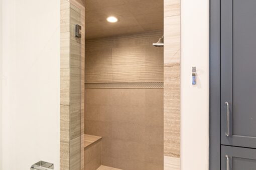 Birchwood walk-in shower with tile bench