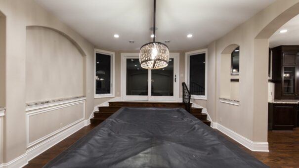 Bella Haven lower-level theater platform with chandelier