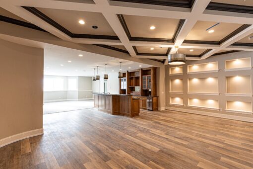 Birchwood lower-level entertaining space with coffered ceiling