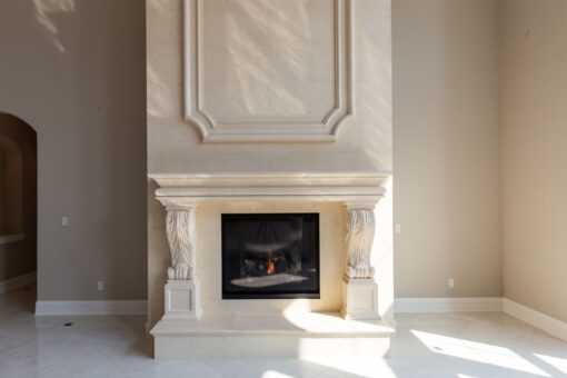 Shire great room carved stone fireplace