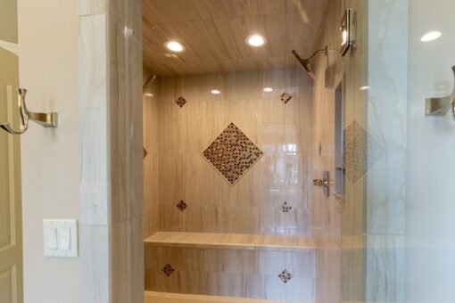 Rivendell walk-in shower with tile medallion