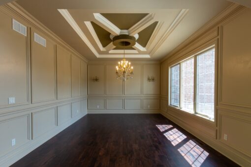 Rivendell dining room with tray ceiling and wainscoting