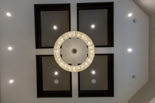 Shire coffered ceiling with round crystal chandelier