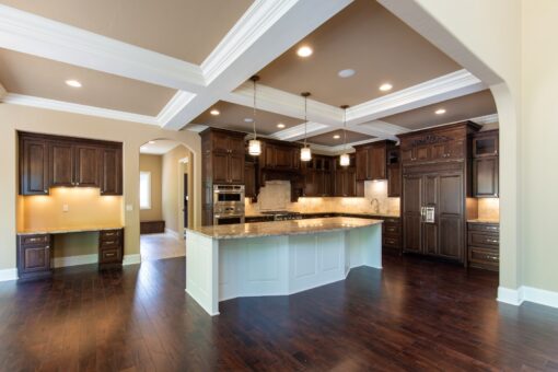 Rivendell kitchen with white island and coffered ceiling