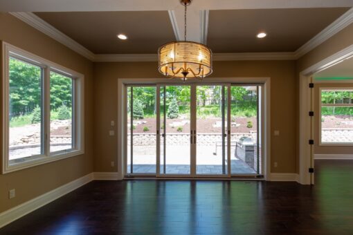 Rivendell breakfast area with sliding doors and chandelier
