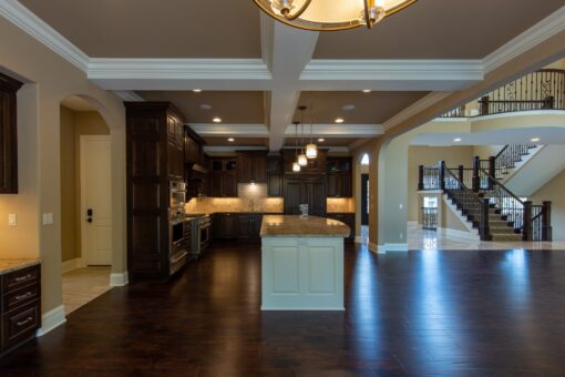 Rivendell kitchen with dark cabinetry and two islands
