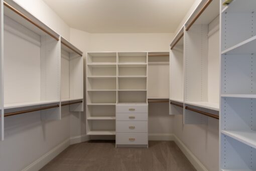 Grand Haven walk-in closet with built-in shelving