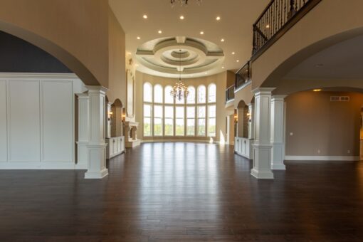 Grand Haven columned hallway looking toward the great room windows