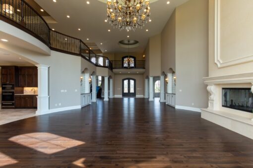 Grand Haven two-story foyer with chandelier and balcony
