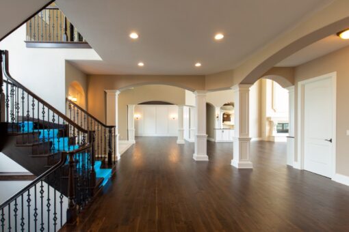 Grand Haven open foyer with staircase and columns