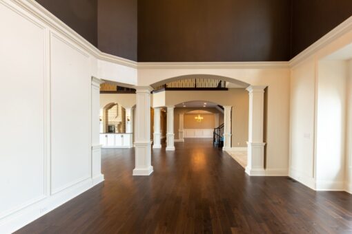 Grand Haven columned gallery hallway with arched openings