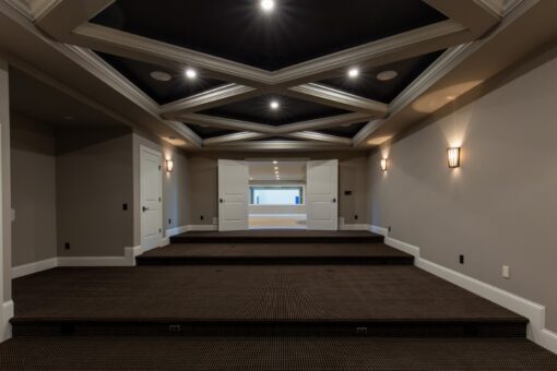 Grand Haven lower-level home theater with coffered ceiling