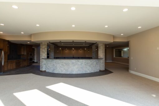 Grand Haven lower-level bar with stone front