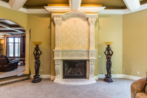 Brandywine great room carved stone fireplace with columns