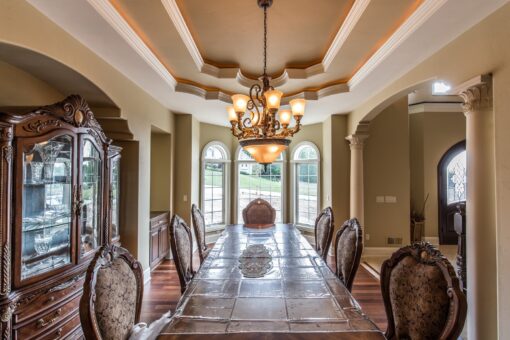 Brandywine dining room with chandelier and tray ceiling