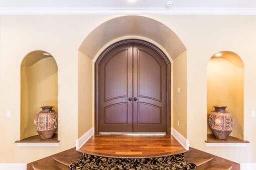 Brandywine arched wood double doors with niches
