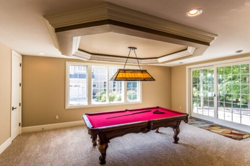 Brandywine lower-level game room with pool table and walk-out doors