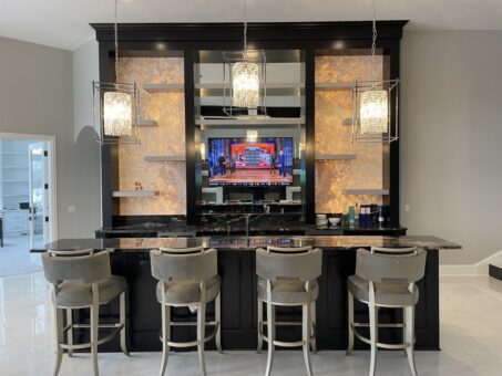 Shire lower-level bar with backlit stone panels