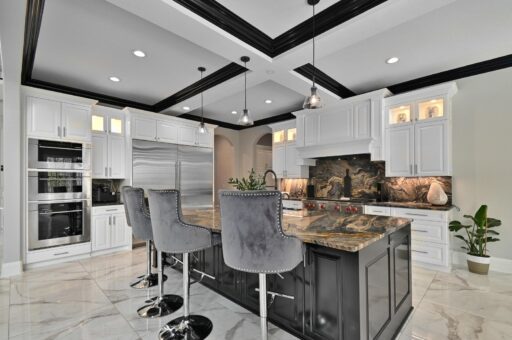 Woodland kitchen with dark island and bar stools