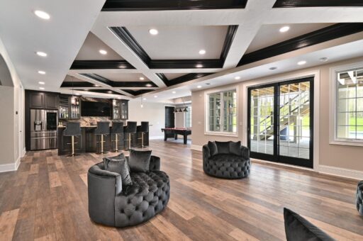Woodland lower-level lounge with coffered ceiling
