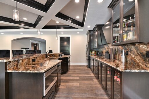 Woodland lower-level bar with stone countertops