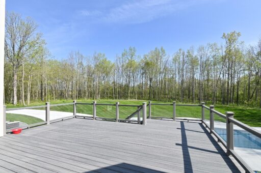 Woodland deck overlooking the wooded lot