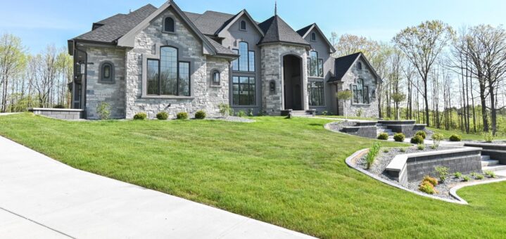 Woodland front elevation with stone exterior