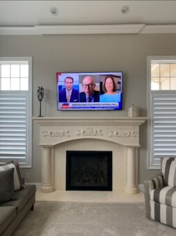 Bella Haven hearth room fireplace with carved mantel