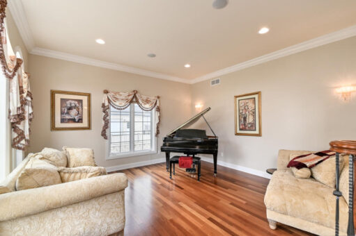 Benington living room with grand piano
