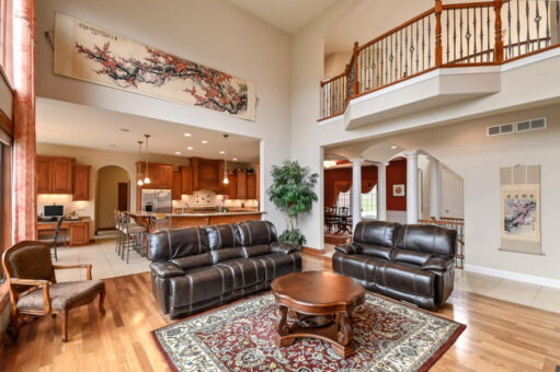 Benington great room with balcony and view to the kitchen