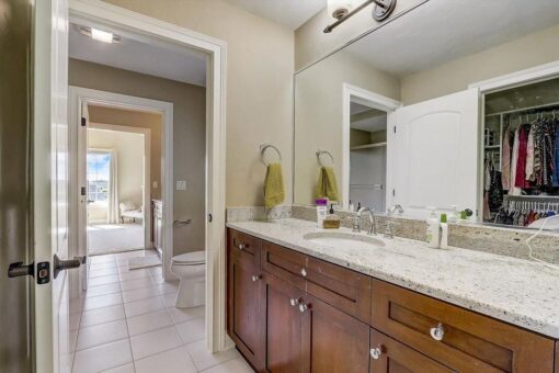 Talon bathroom with wood double vanity