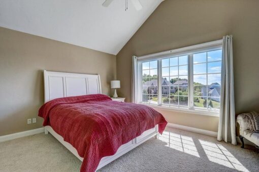 Talon bedroom with large window