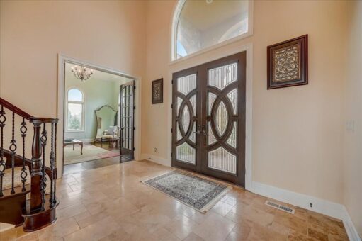 Edington decorative iron and glass entry doors