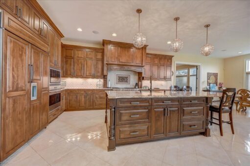 Edington kitchen with wood cabinetry and island