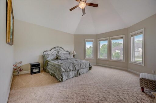 Edington bedroom with vaulted ceiling
